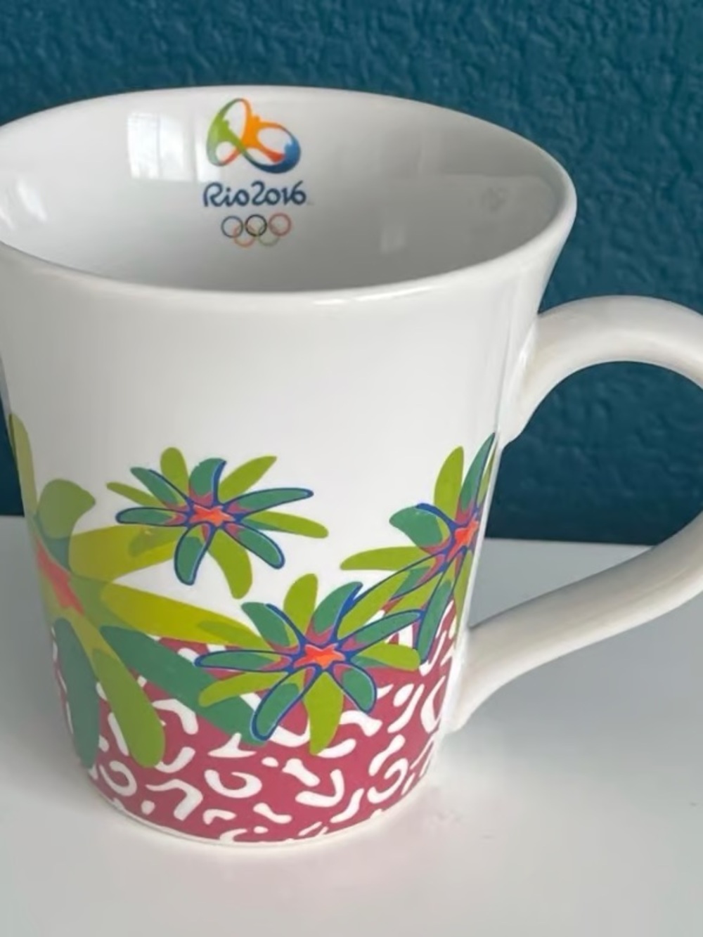 Rio 2016 Ceramic Mug with White and Green Tropical Design